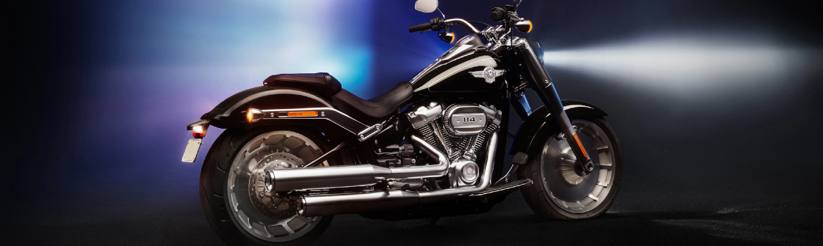 A Harley-Davidson® Fat Boy model on a dark background.