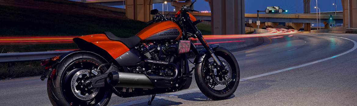 A Harley-Davidson® FXDR motorcycle parked on a blocked off highway.